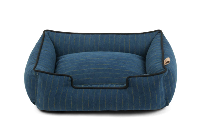 P.L.A.Y. Manhattan Lounge Bed in blue with raised sides for pet comfort, bolster style dog bed.