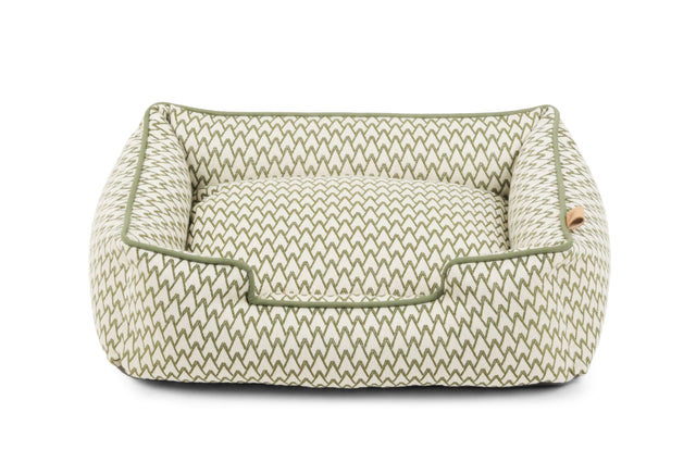 Bolster style dog bed in soothing olive green, crafted with elevated sides for ultimate comfort, inspired by Napa Valley's wine country.