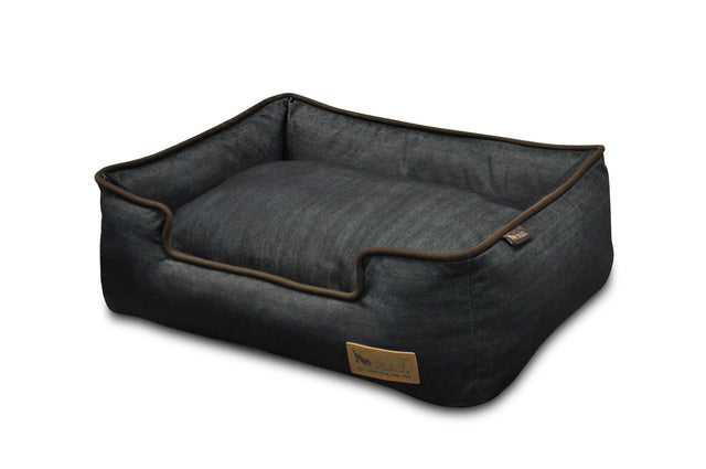 P.L.A.Y. Denim Lounge Bed for dogs with soft, durable denim and chic piping, providing a cozy sleeping space for pets.