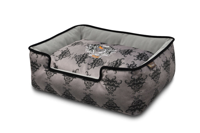 P.L.A.Y. Royal Crest Lounge Bed with sophisticated Victorian-style print and plush black suede for pampered dogs, raised sides for headrest.
