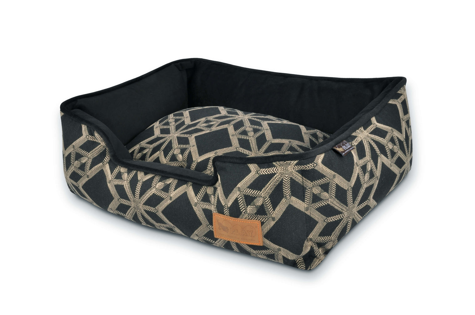 P.L.A.Y. Solstice Lounge Bed with striking geometric patterns in black and grey, featuring high supportive sides for comfortable lounging