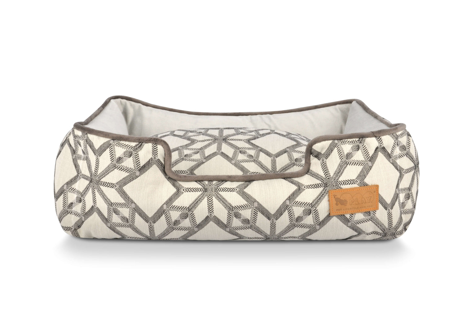 P.L.A.Y. Solstice Lounge Bed with geometric patterns and high supportive sides in neutral color, perfect for pets' sunbathing and snoozing
