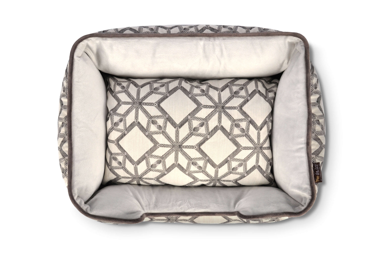 P.L.A.Y. Solstice Lounge Bed with geometric patterns featuring high supportive sides in modern design for pets