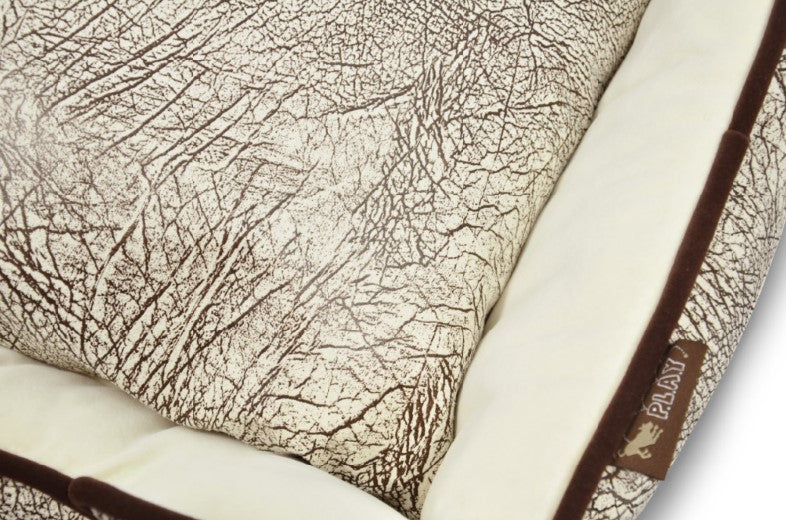 Close-up of P.L.A.Y. Savannah Lounge Bed with wild grassy plains pattern and soft velvety microsuede fabric.