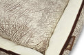 Close-up of P.L.A.Y. Savannah Lounge Bed with wild grassy plains pattern and soft velvety microsuede fabric.