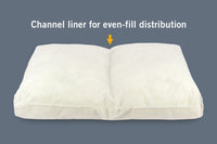 Inside view of striped dog bed showcasing channel liner for even fill distribution.