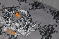 Royal Crest Victorian-style print on P.L.A.Y. Royal Crest Lounge Bed with plush black suede and intricate design for luxury pampering