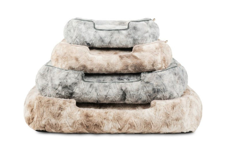 Stack of P.L.A.Y. Dreamland Lounge Beds in faux fur fabric showing different sizes and two cozy color options