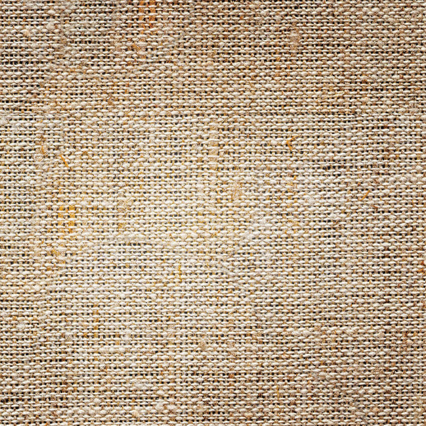 Close-up of a textured woven fabric in neutral tones, ideal for adding warmth and elegance to any space.