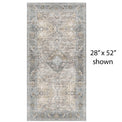 Decorative vinyl mat with a central medallion design in shades of gray, beige, and brown.