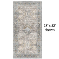 Decorative vinyl mat with a central medallion design in shades of gray, beige, and brown.