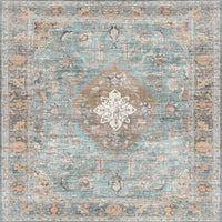 Decorative vinyl mat with a central medallion design in turquoise, beige, and brown on a light gray background. close-up