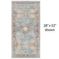 Decorative vinyl mat with a central medallion design in turquoise, beige, and brown on a light gray background.