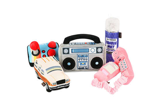 80s Classics Plush Toy Set featuring boom box, retro phone, arcade joystick, race car, and classic soda design for dogs.