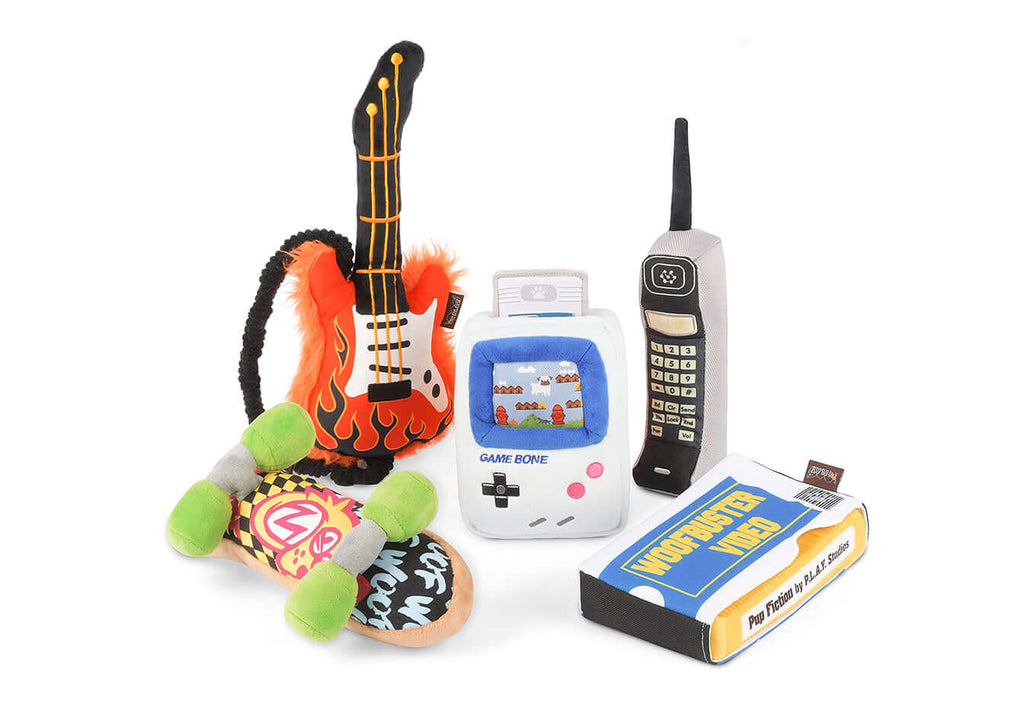 90s Classic Toy Set plush collection featuring skateboard, electric guitar, retro game console, cell phone, and cassette tape dog toys.