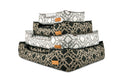 P.L.A.Y. Solstice Lounge Beds in geometric patterns stacked in various sizes and colors for royal comfort of your furry friend