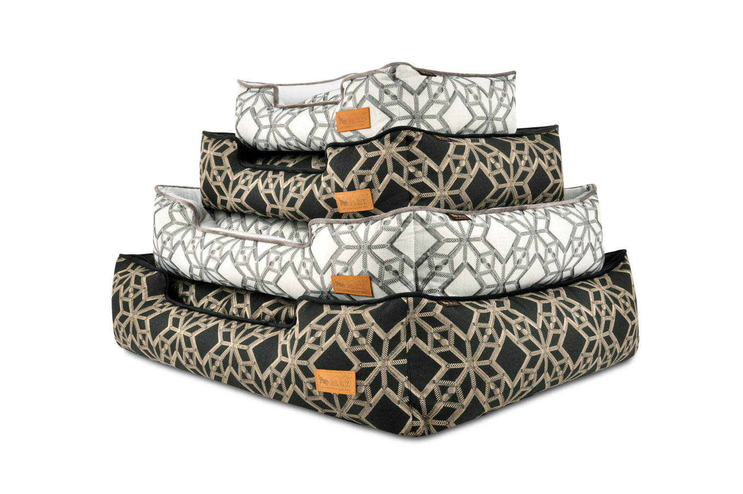 P.L.A.Y. Solstice Lounge Beds in geometric patterns stacked in various sizes and colors for royal comfort of your furry friend