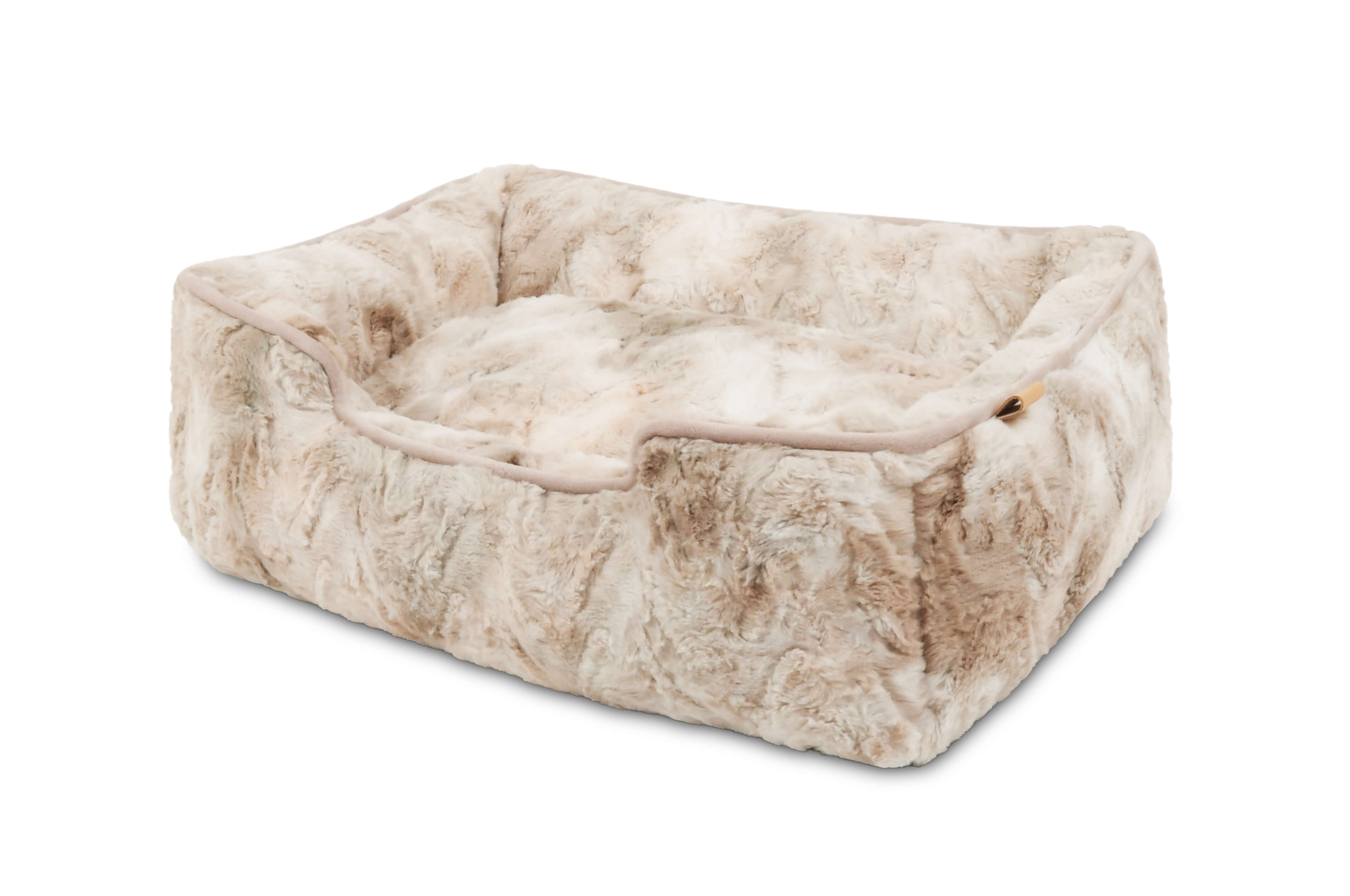 Plush faux fur Dreamland Lounge Bed for dogs with high sides for extra support.