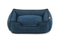 P.L.A.Y. Manhattan Lounge Bed in blue with raised sides for pet comfort, bolster style dog bed.