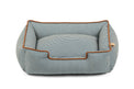 Striped bolster style dog bed with raised sides for headrest, designed in sleek fabric for comfort by P.L.A.Y. Manhattan Lounge Beds