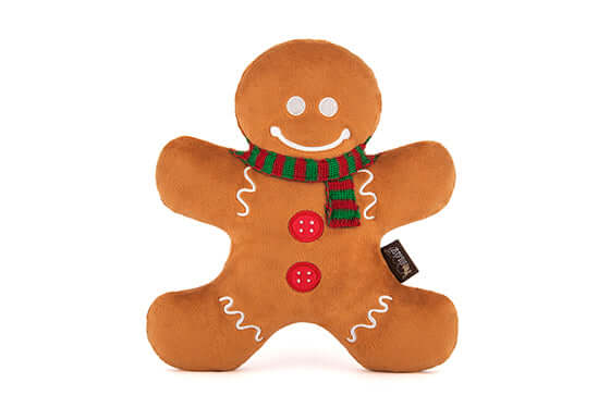 Festive dog toy shaped like a gingerbread man, part of the P.L.A.Y. Holiday Classic Toy Set, featuring plush and squeaky material.