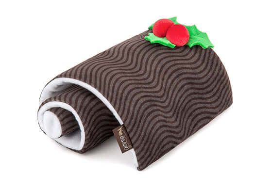 Plush Yule Log dog toy from P.L.A.Y. Holiday Classic Toy Set, featuring festive holly berry embellishments for holiday fun.