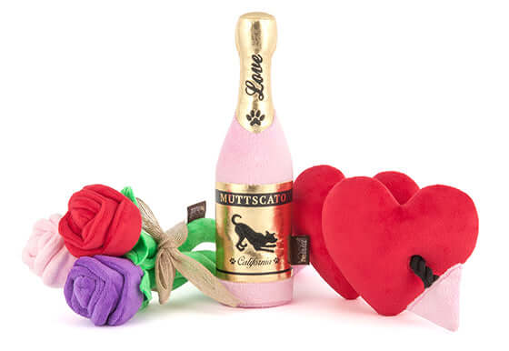 Puppy Love Toy Set with champagne bottle, bouquet of flowers, and hearts, perfect for celebrating the bond with your dog.