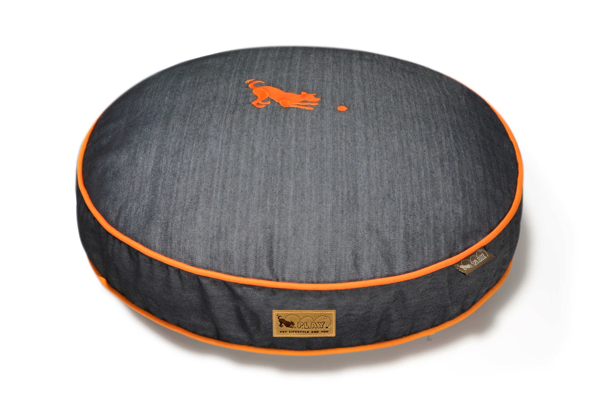 P.L.A.Y. Urban Denim Round Dog Bed with orange trim, perfect for snuggling, lounging, and dreaming in classic blue jean charm.