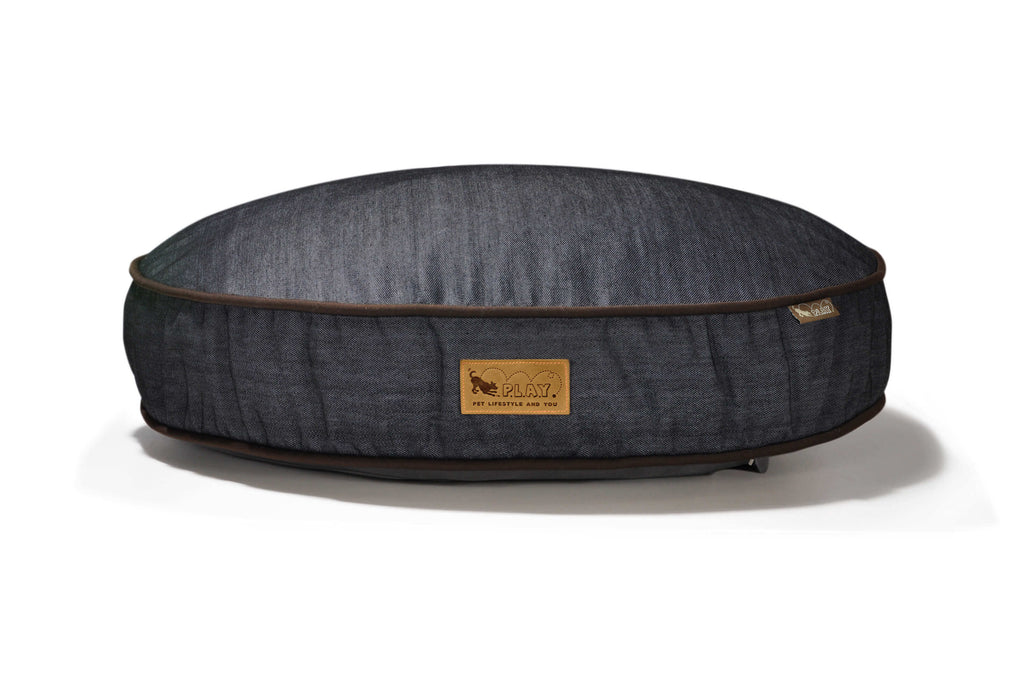 P.L.A.Y. Urban Denim Round Bed for dogs crafted from soft, sturdy denim with classic blue jean charm. Cozy and stylish pet bed.