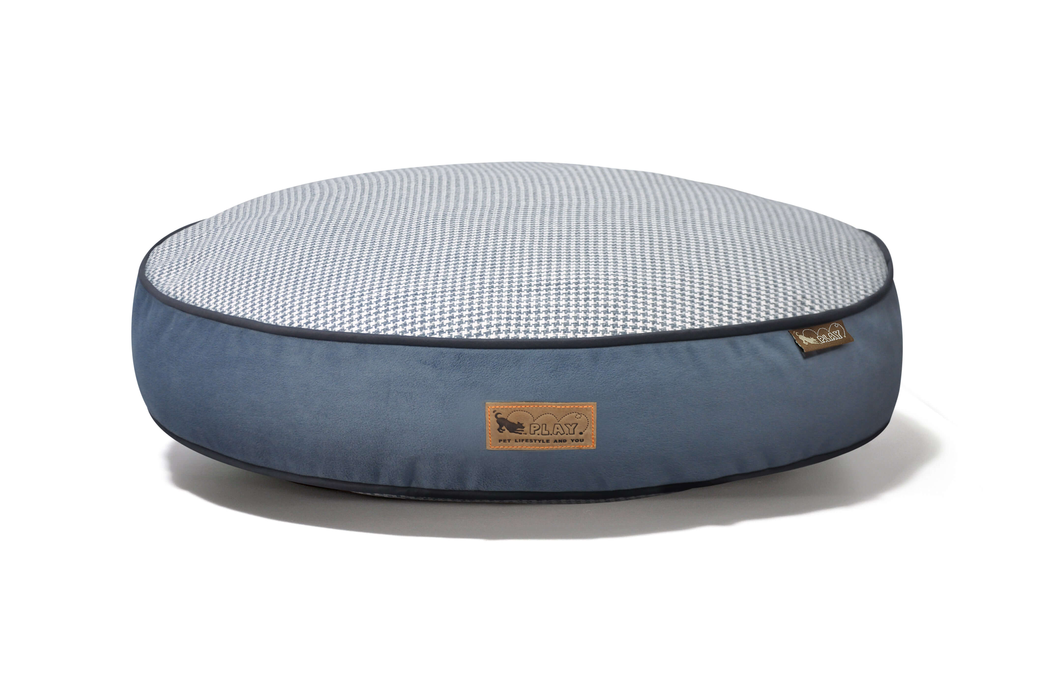 P.L.A.Y. Houndstooth Round Bed in blue, perfect for stylish and comfortable dog naps, featuring a classic and sophisticated design.