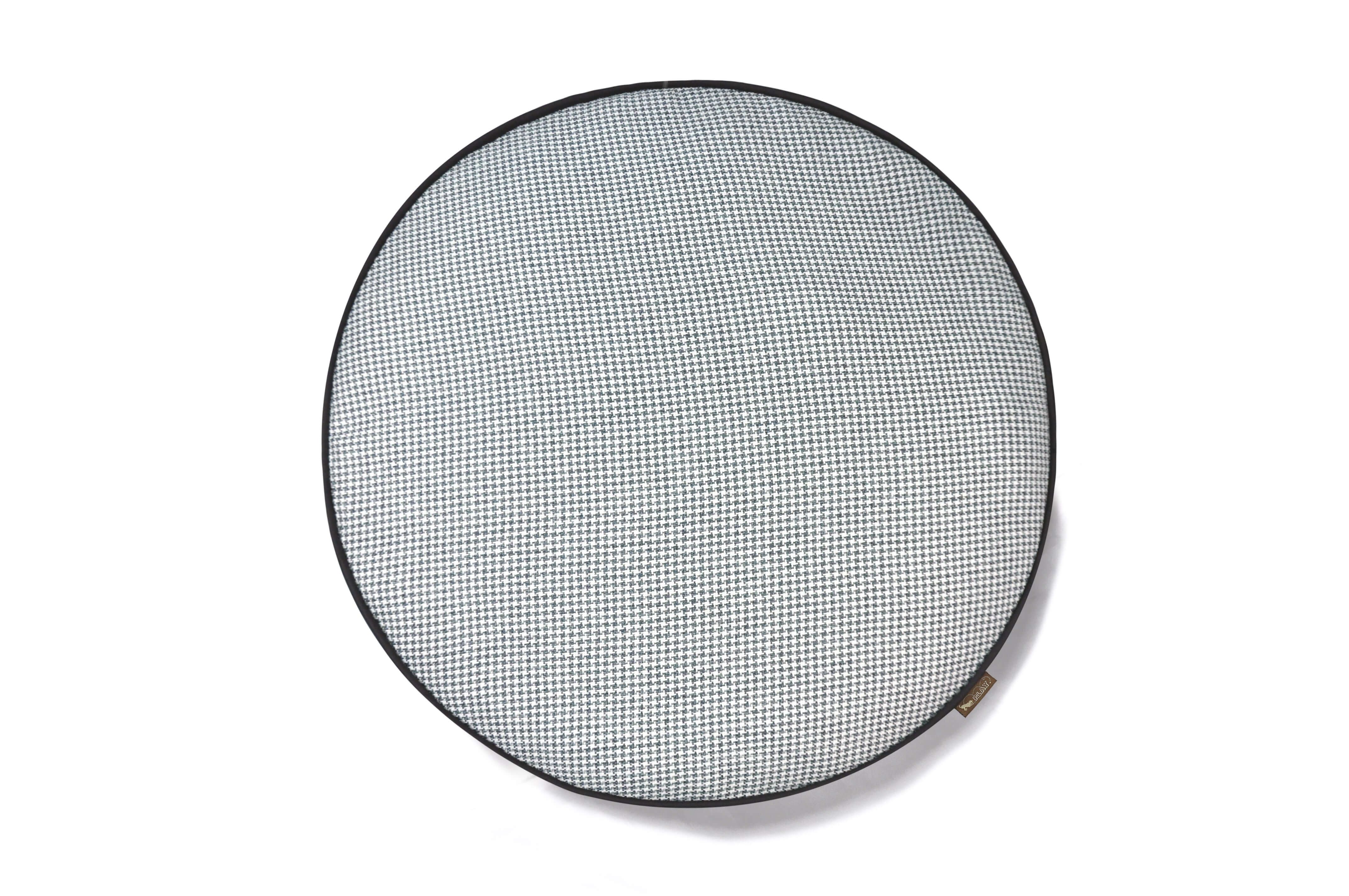 P.L.A.Y. Houndstooth Round Dog Bed in classic black and white pattern, perfect for stylish and sophisticated pet naps.