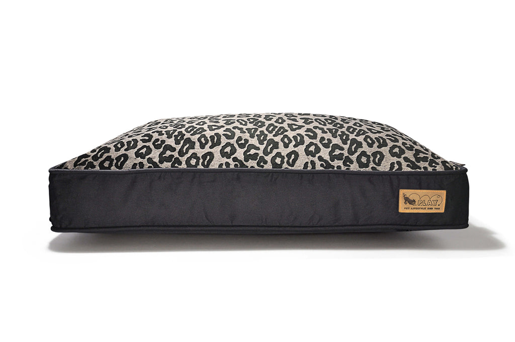 Serengeti style rectangle shaped dog bed with bold animal print and ultra-soft velvet material for comfort.