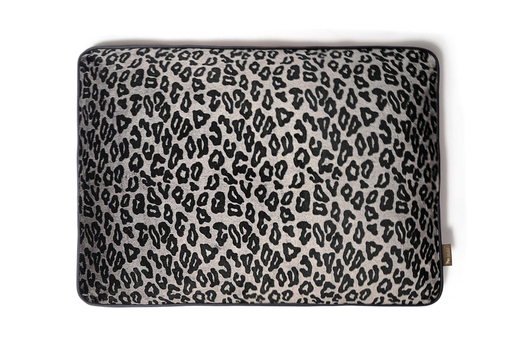 Serengeti style rectangle shaped dog bed with bold animal print and ultra-soft velvet material.