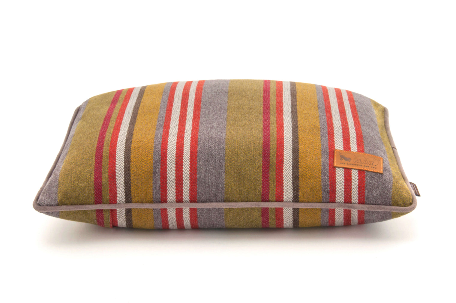 Striped P.L.A.Y. Horizon Pillow Bed with earthy colors, perfect for cozy cabin or beachside retreat, durable fabric for pups to snooze comfortably.
