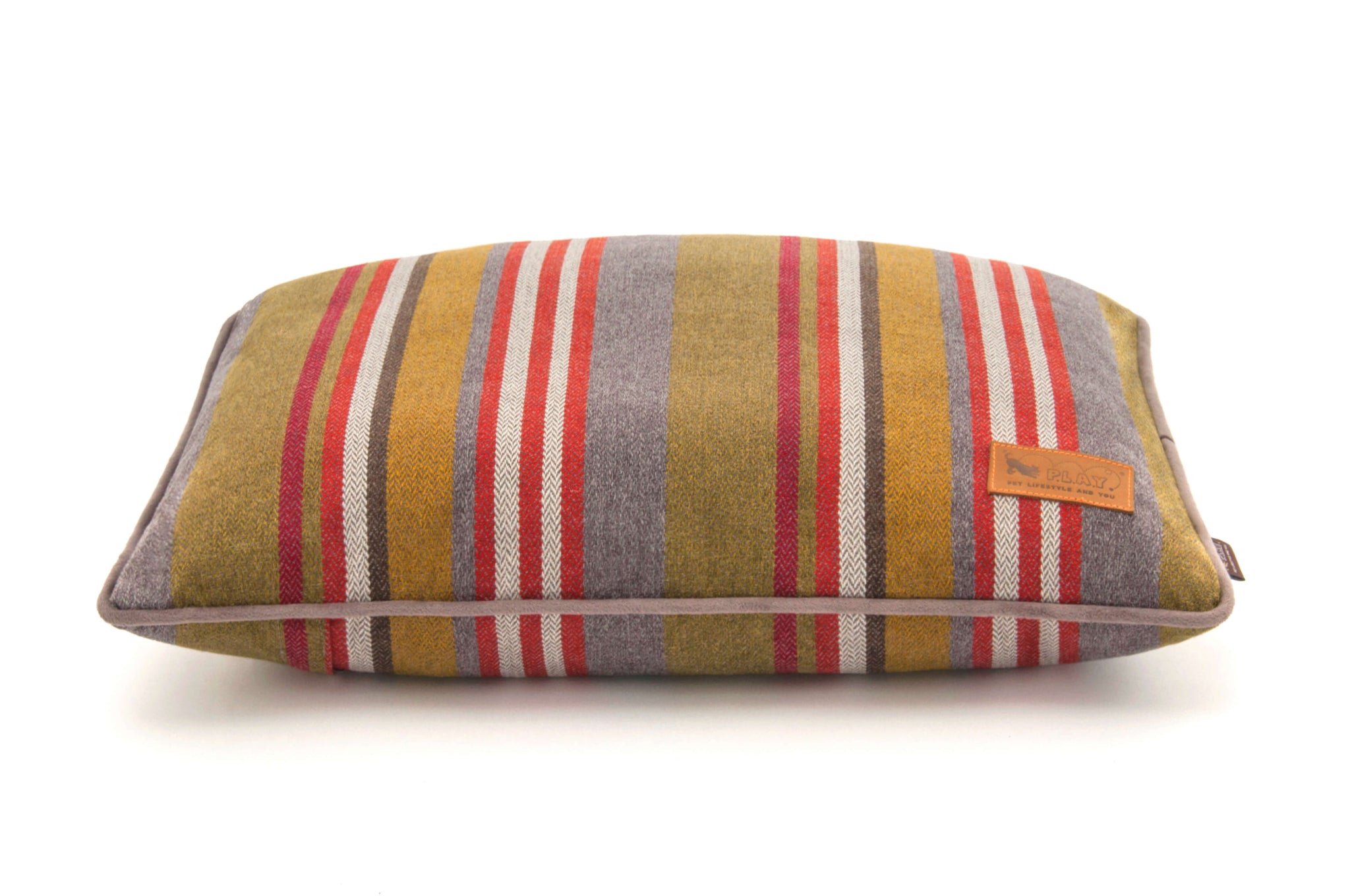 Striped P.L.A.Y. Horizon Pillow Bed with earthy colors, perfect for cozy cabin or beachside retreat, durable fabric for pups to snooze comfortably.