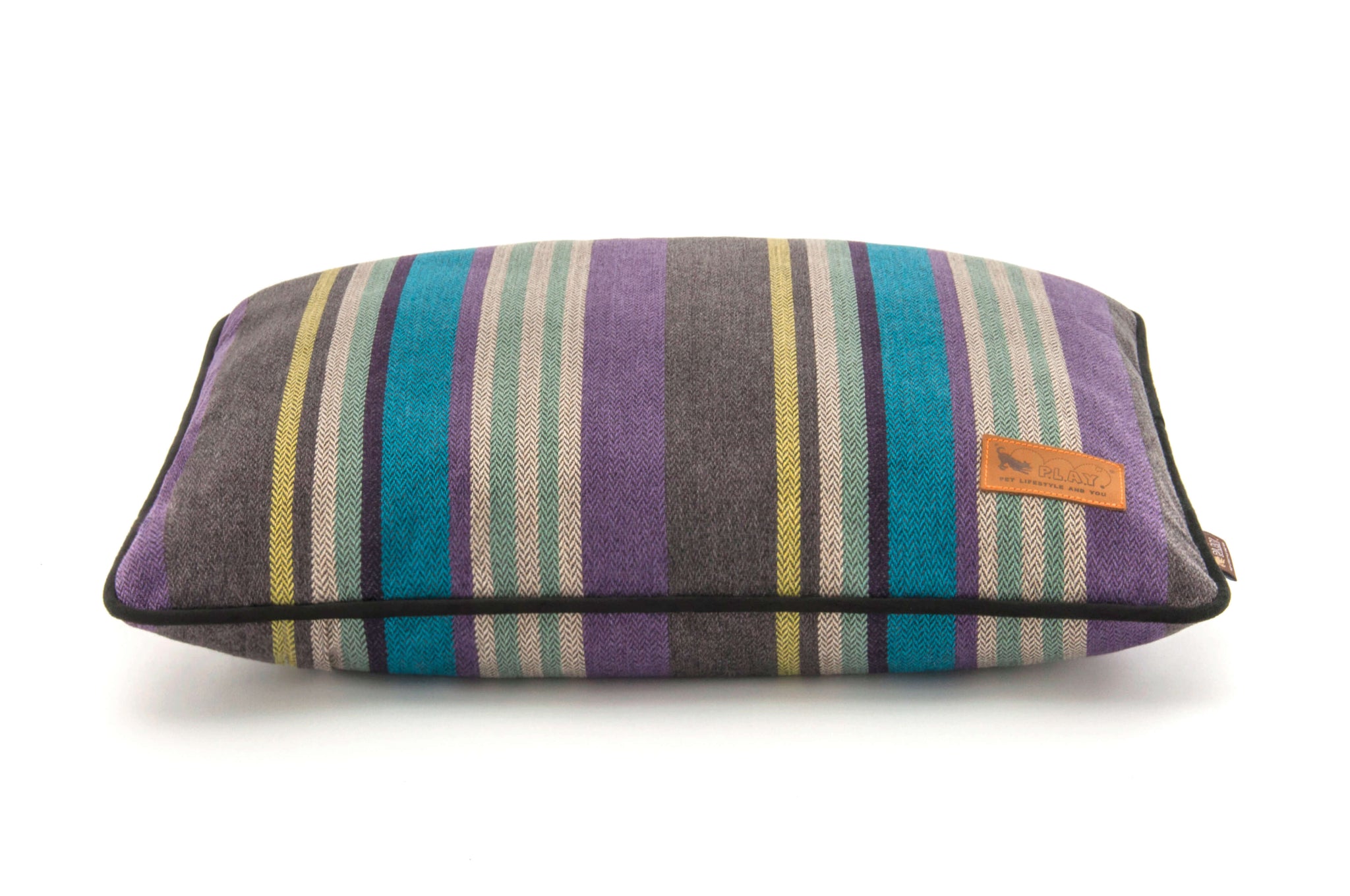 P.L.A.Y. Horizon Pillow Bed with colorful earthy-striped design, durable woven fabric for cozy comfort, inspired by nature's rich hues.