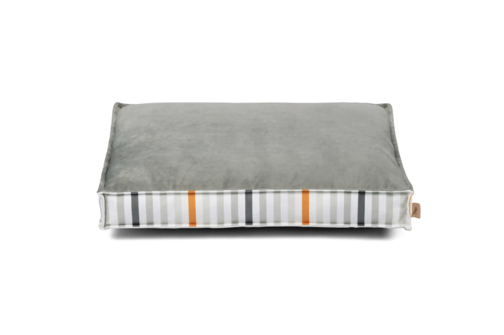 P.L.A.Y. Seaside Boxy Bed with contemporary stripes and reversible cover for dogs, providing ultimate comfort.