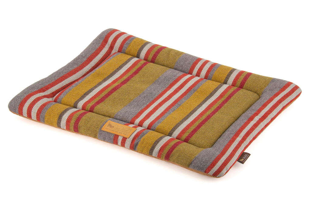 Colorful striped Horizon Chill Pad for pets made with durable woven fabric, perfect for travel or home lounging.