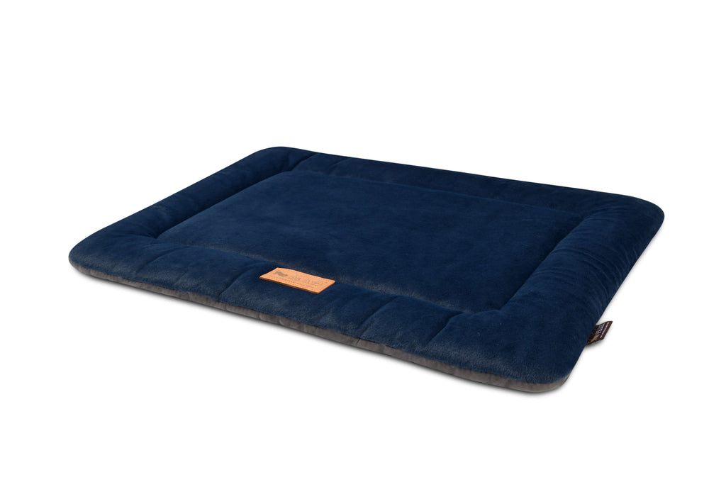 Ultra-soft navy blue pet chill pad from P.L.A.Y. Coastal Series for cozy relaxation and durability in any space.