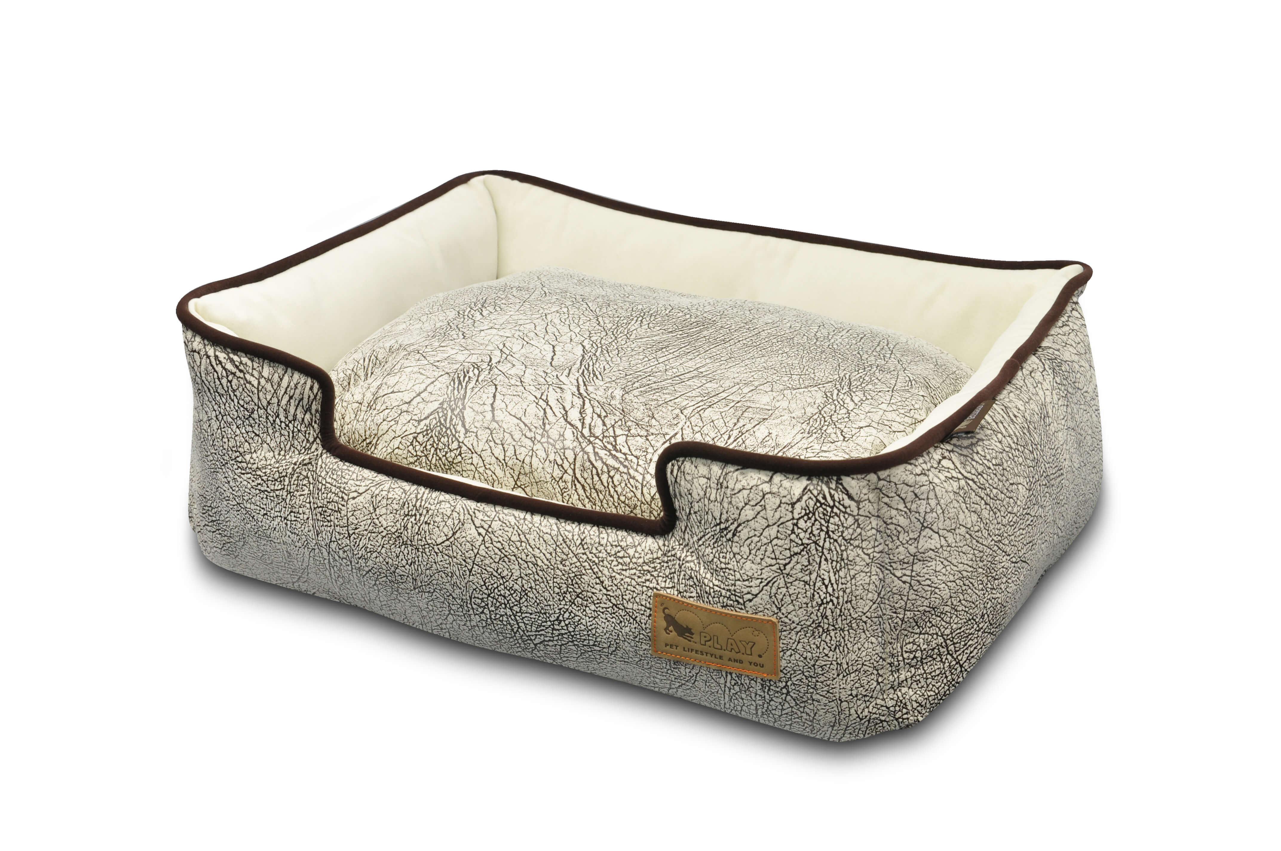 P.L.A.Y. Savannah Lounge Bed with savannah-inspired fabric pattern and soft velvety microsuede for dogs, with raised comfy headrest