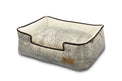 P.L.A.Y. Savannah Lounge Bed with savannah-inspired fabric pattern and soft velvety microsuede for dogs, with raised comfy headrest
