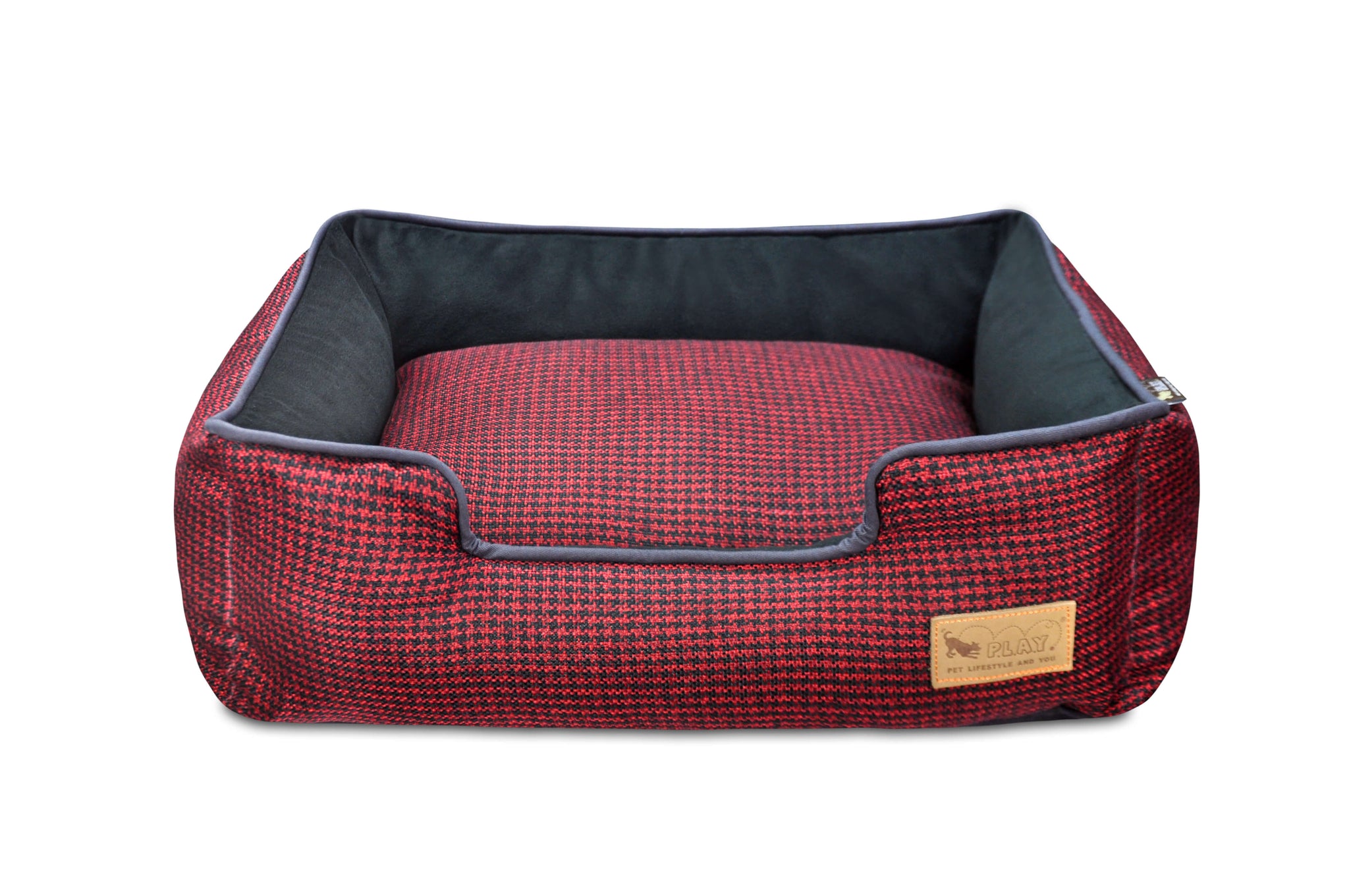 Red houndstooth lounge bed for dogs with raised sides for headrest.