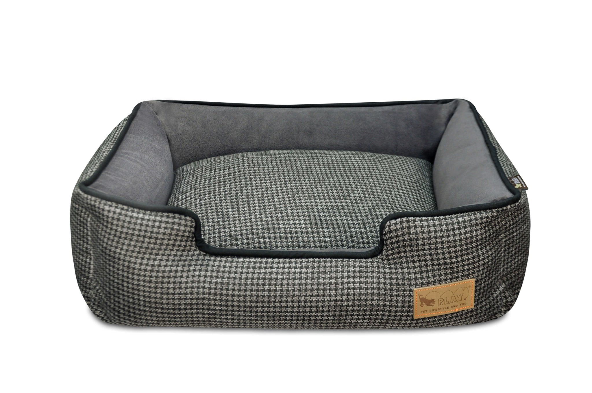 Houndstooth dog lounge bed with raised sides for headrest and sophisticated design.