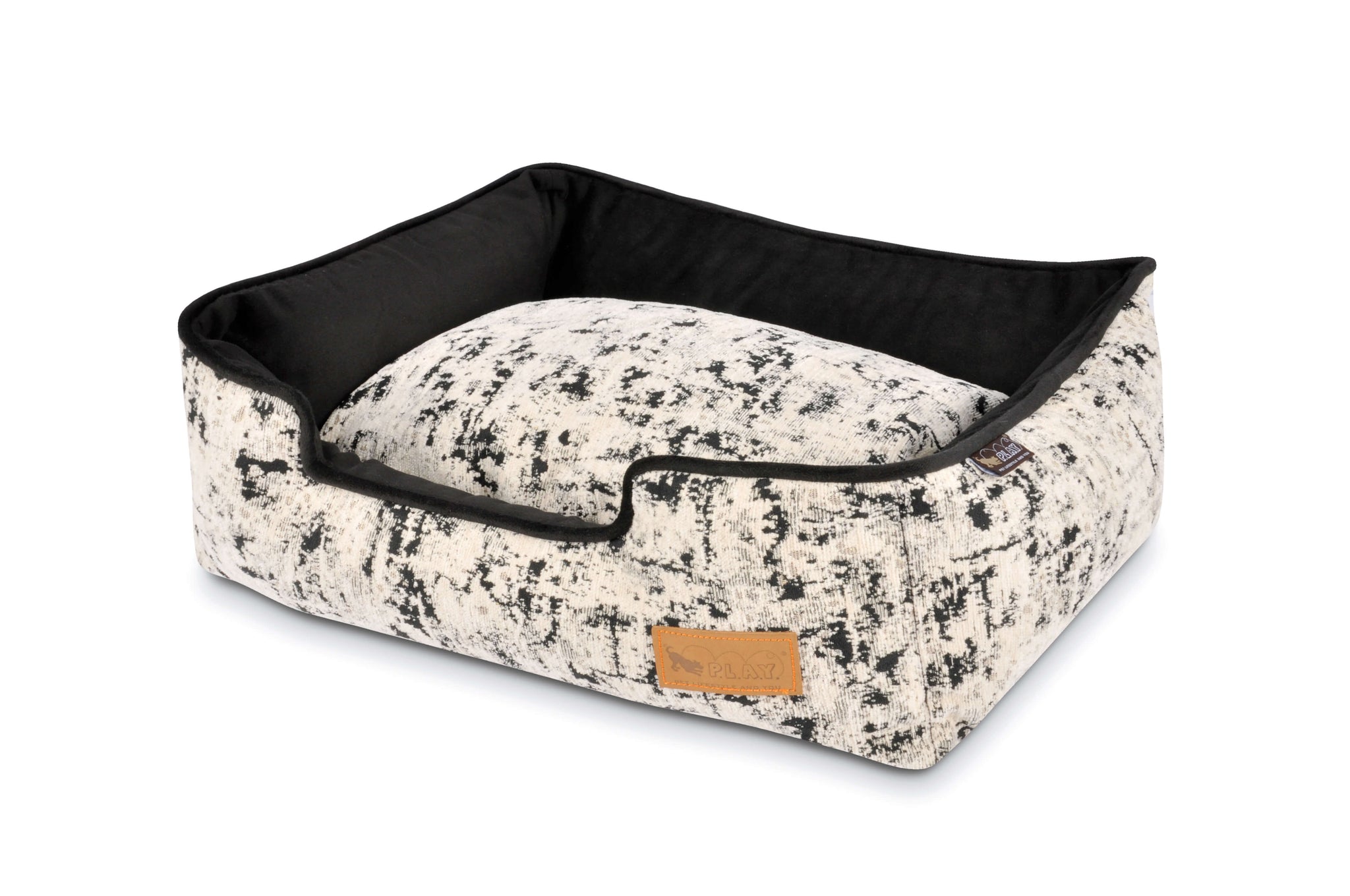 P.L.A.Y. Celestial Lounge Bed for pets in Night Sky Black with elevated sides for headrest and sleek modern design.