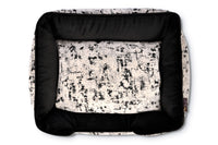 P.L.A.Y. Celestial Lounge Pet Bed in Night Sky Black with elevated sides for comfort and style, top view