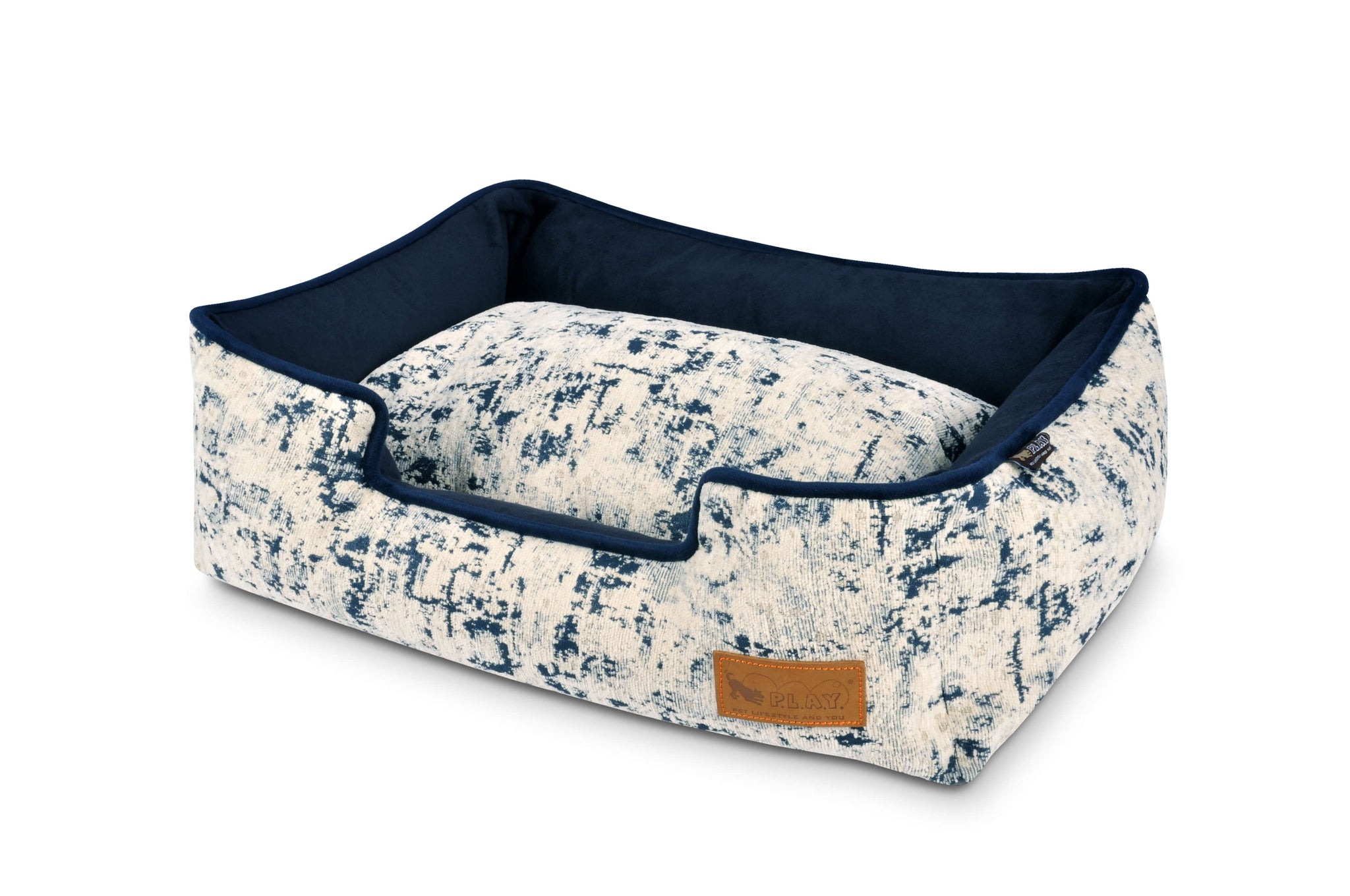 P.L.A.Y. Celestial Lounge Bed in Midnight Blue for dogs, featuring a modern design with elevated sides for added comfort.