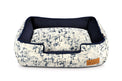 P.L.A.Y. Celestial Lounge Bed in Midnight Blue with elevated sides and modern design for ultimate pet comfort and style.