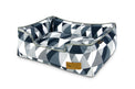 P.L.A.Y. Mosaic Lounge Bed in Tuxedo with colorful geometric pattern made from 100% natural cotton for stylish and comfortable pet lounging.