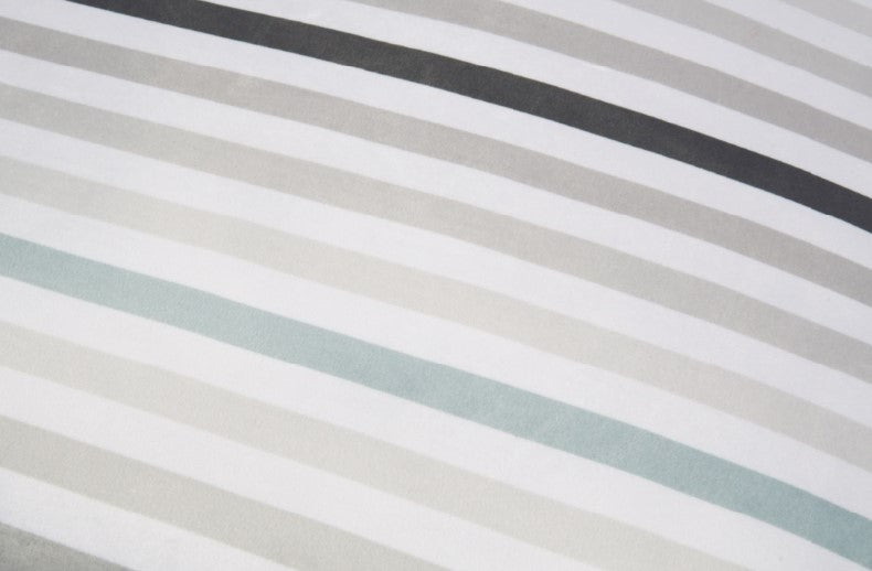 Close-up of contemporary striped design on the P.L.A.Y. Seaside Boxy Bed, featuring neutral tones and a reversible cover for a stylish dog bed.