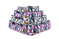P.L.A.Y. Mosaic Lounge Beds with colorful geometric pattern in Tuxedo and Soda Pop colors stacked together.